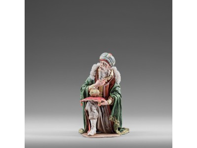 König kniend